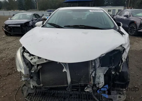 2016 Toyota Corolla L from USA, damaged, VIN 2T1BURHE1GC585561